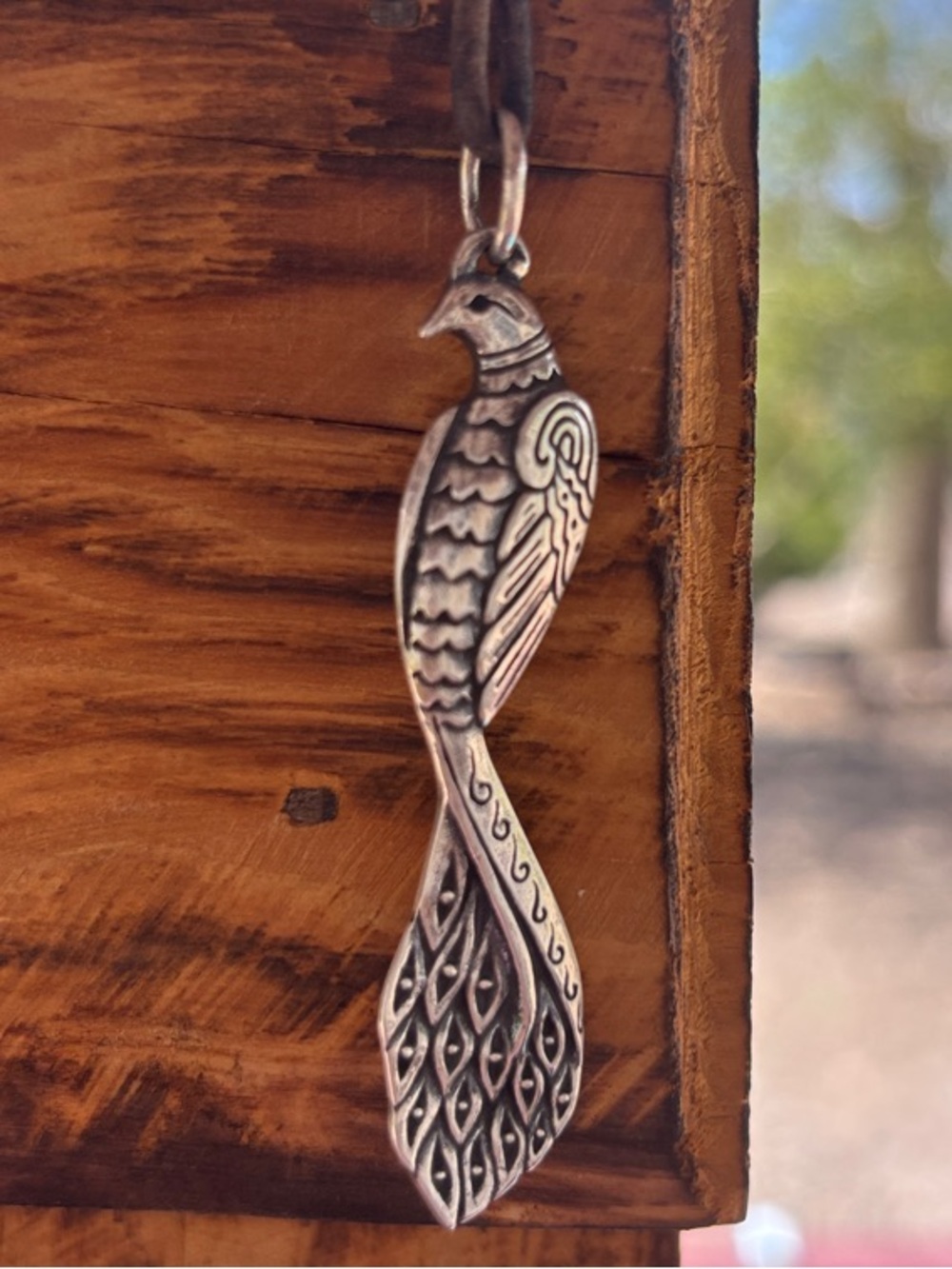 James Avery DISCONTINUED Silver Peacock Pendant on Brown leather Cord